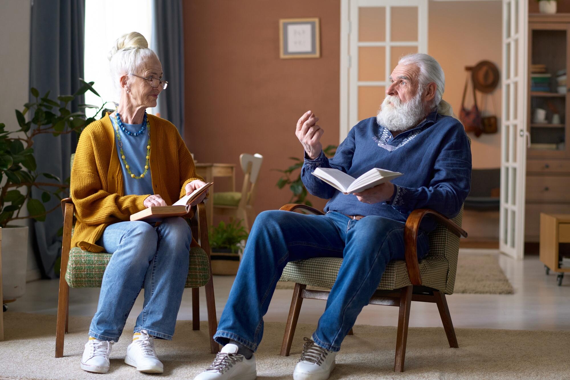 Senior couple discussing books together